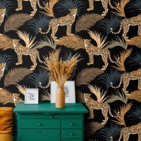 Tropical wild animals wallpaper with jaguars and palm leaves