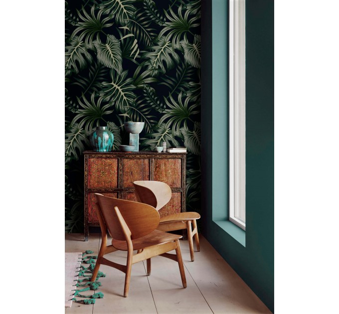 Dark tropical wallpaper with palm leaves