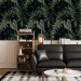 Dark tropical wallpaper with palm leaves