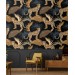 Tropical wild animals wallpaper with jaguars and palm leaves