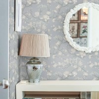 Wallpaper white flowers and branches on a pastel blue