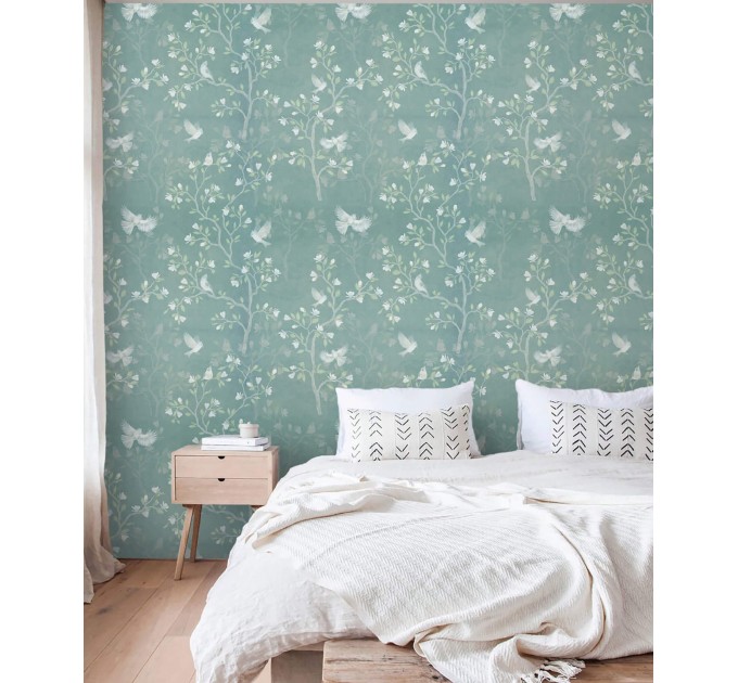 Vintage style blue wallpaper birds and blooming branches